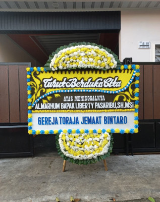Papan Bunga Duka di Muararapak